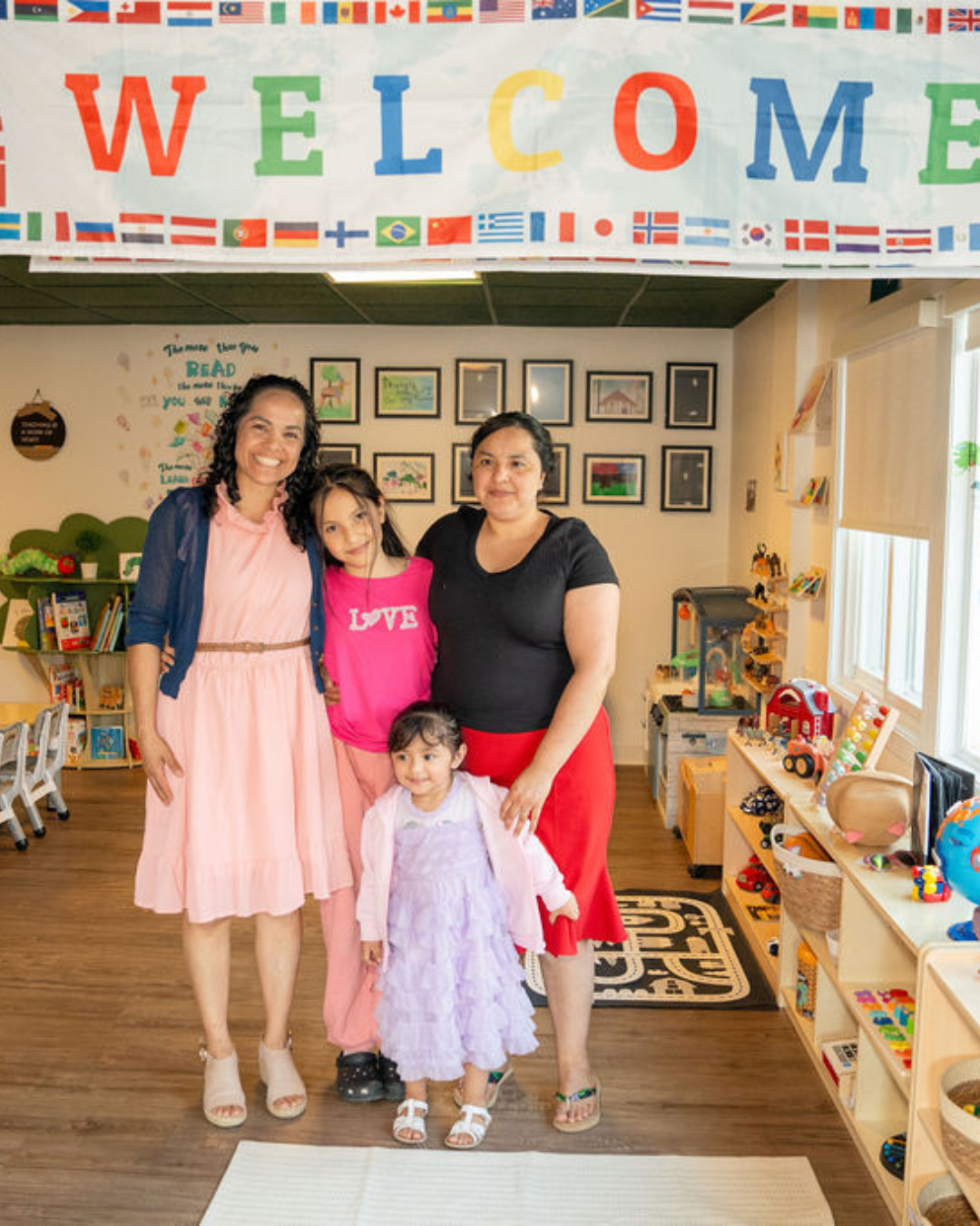 family poses in a childcare center